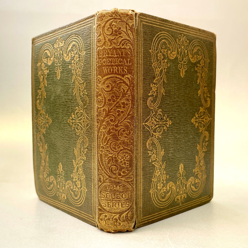 Spine and boards detail of Bryant’s Poetical Works showing gilt lettering and decoration