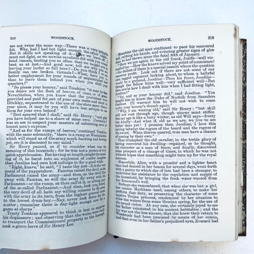 サムネイル： Page 218 of Woodstock Rosslyn Edition with corresponding small hole from production, mild age toning, and clean, legible text