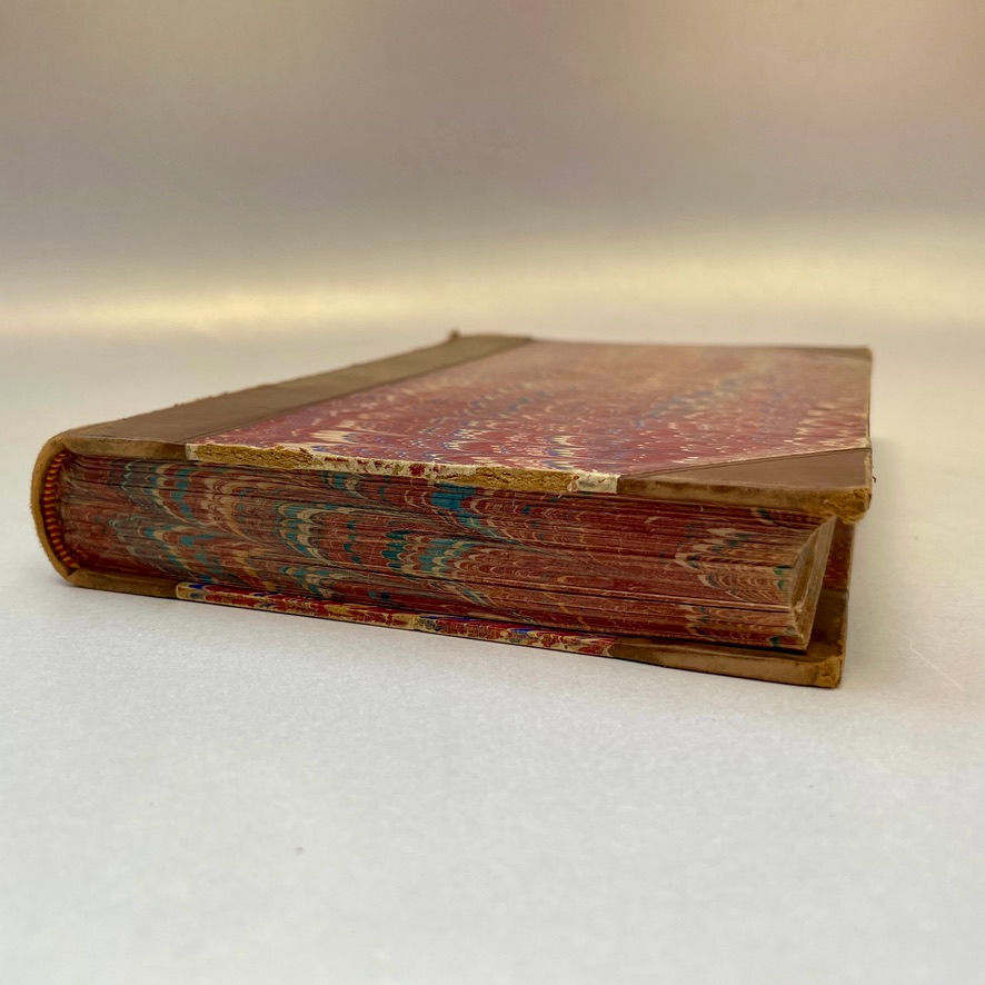 Thumbnail: Fore-edge of pages – Highlighting the marbled edges and clean, uniform page alignment.