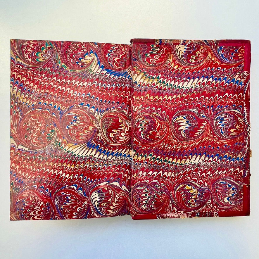 Miniaturbild: Rear marbled pastedown of Pendennis Vol. 1 (1879), matching fine marbled pattern.