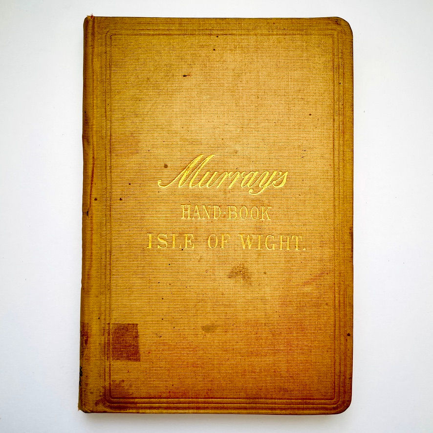 Miniatyrbild: Front board of A Handbook for Travellers in the Isle of Wight, 1898 John Murray, faded red cloth