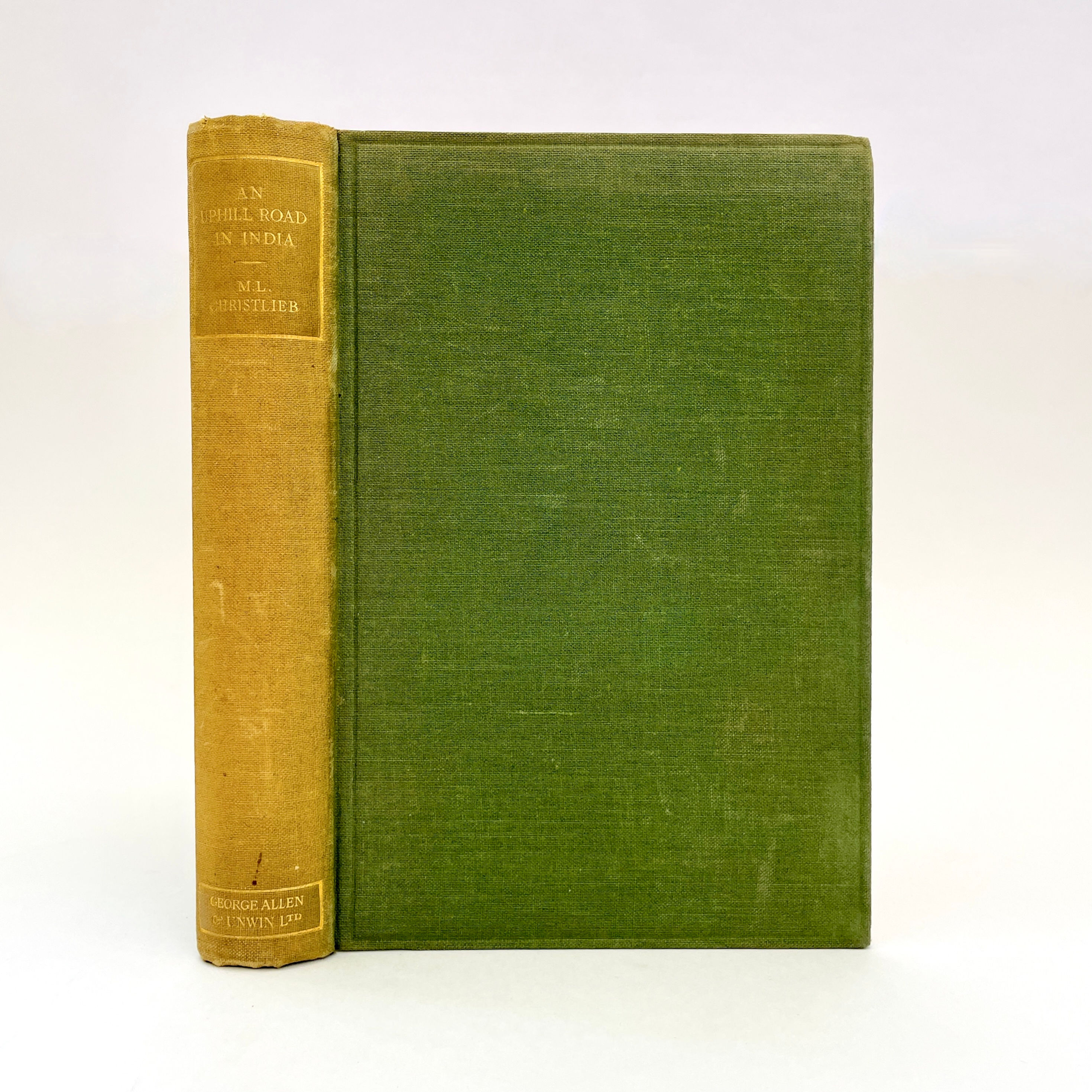 Front cover and spine of 1927 first edition An Uphill Road in India hardback