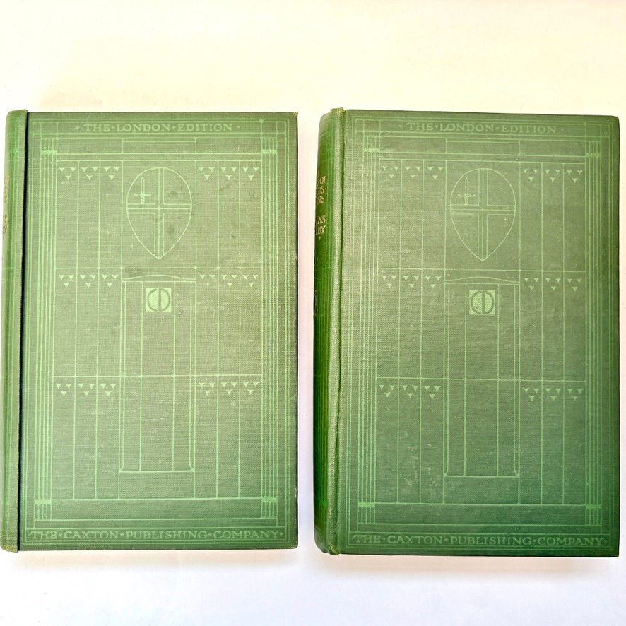 Matching green cloth front boards of Dickens's Nicholas Nickleby, two-volume Caxton London Edition