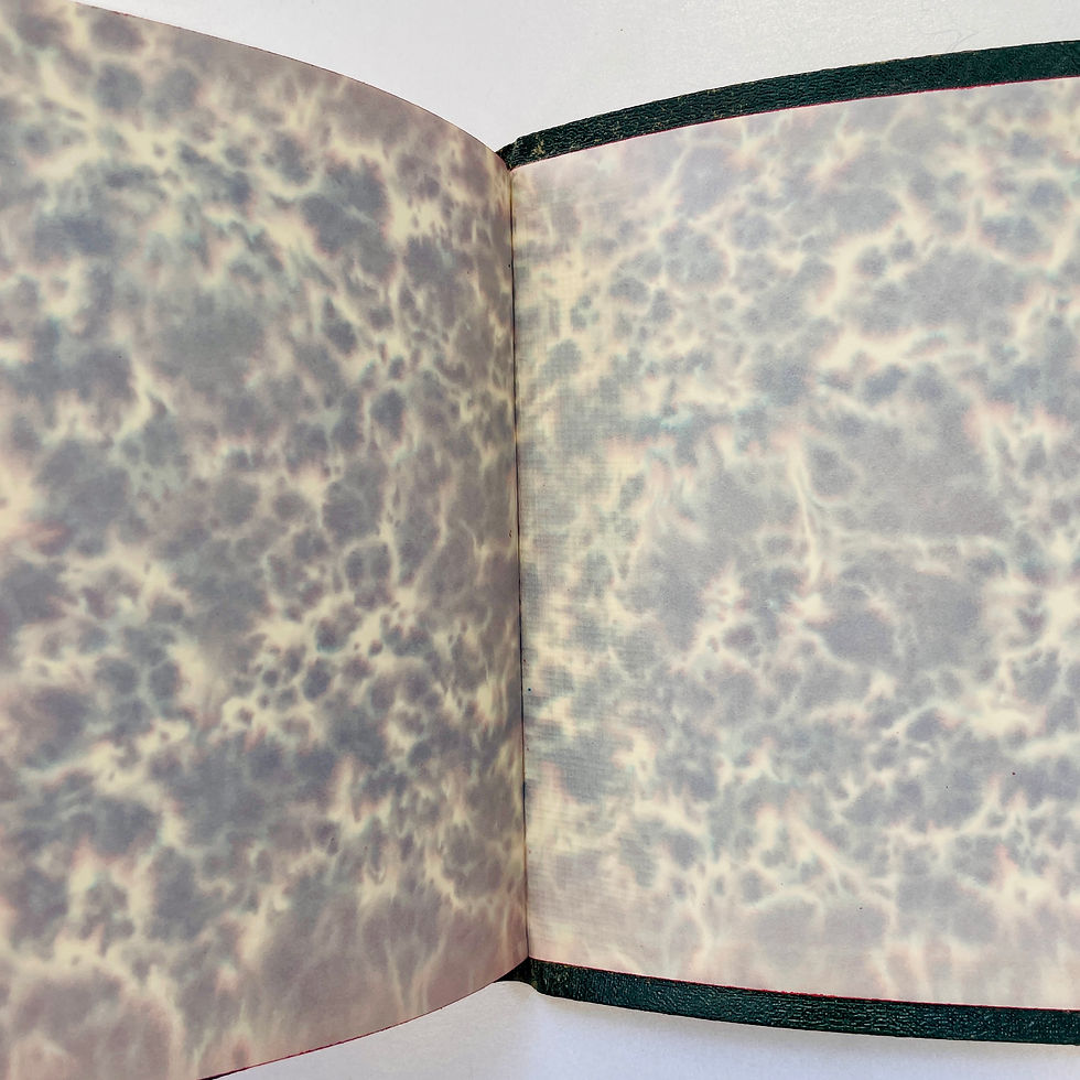 Miniatura: Marbled rear pastedown and endpaper of Rubáiyát 1953 edition