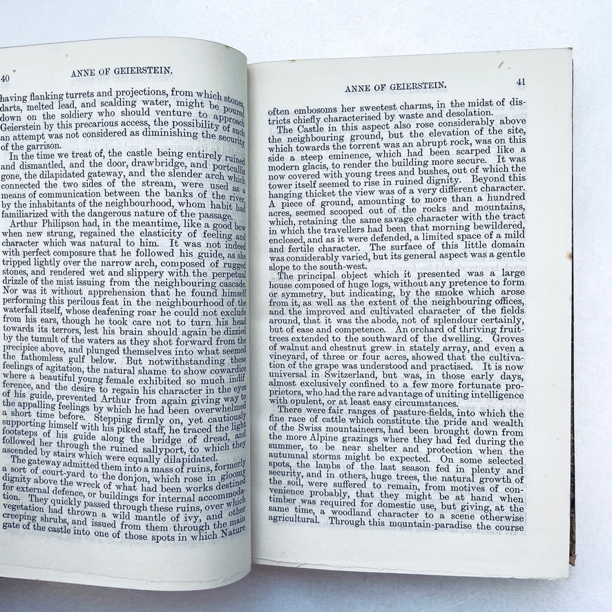 縮圖：Interior spread pages 40–41 with clean text and mild age toning.