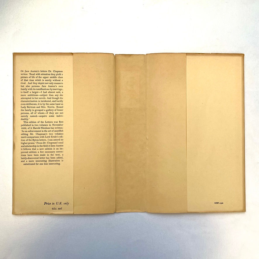 Pikkukuva: Inside view of unclipped dust jacket showing printed price and Oxford University Press details