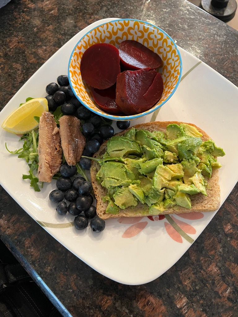 Pickled beet root, blueberries, arugula, sardines, lemon, sourdough bread, avocado 10 minute functional food plate. 