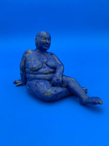 BLUE LOUNGING FIGURE