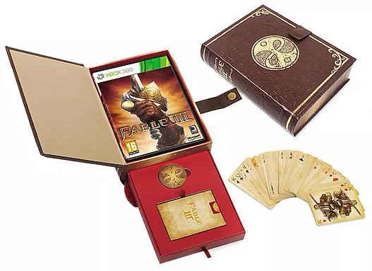 Fable III Collector’s Edition Items including hard cover “book” that holds game case and features a hidden side compartment revealing a distressed deck of cards with game characters and a Good & Evil guild seal coin.