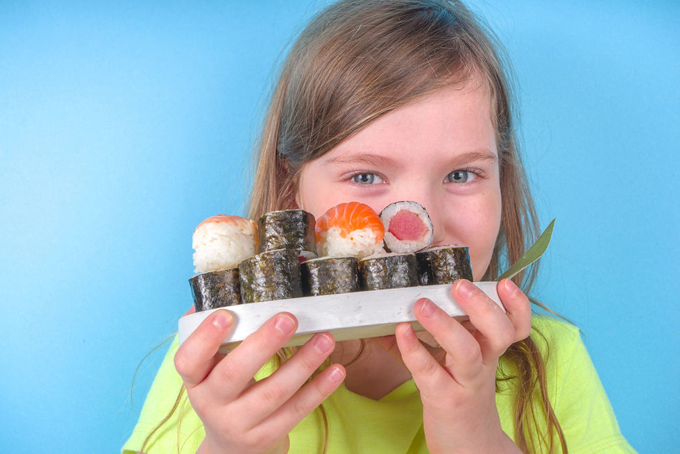 child with sushi