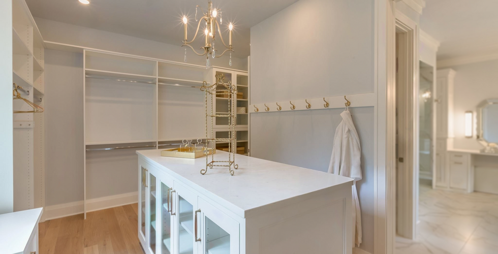 white closet remodel w jewelry cabinet