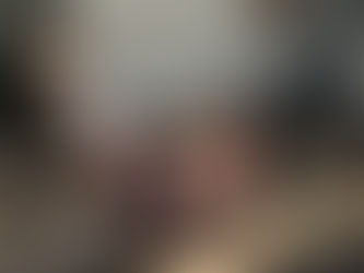 A woman practicing Pilates on a Reformer