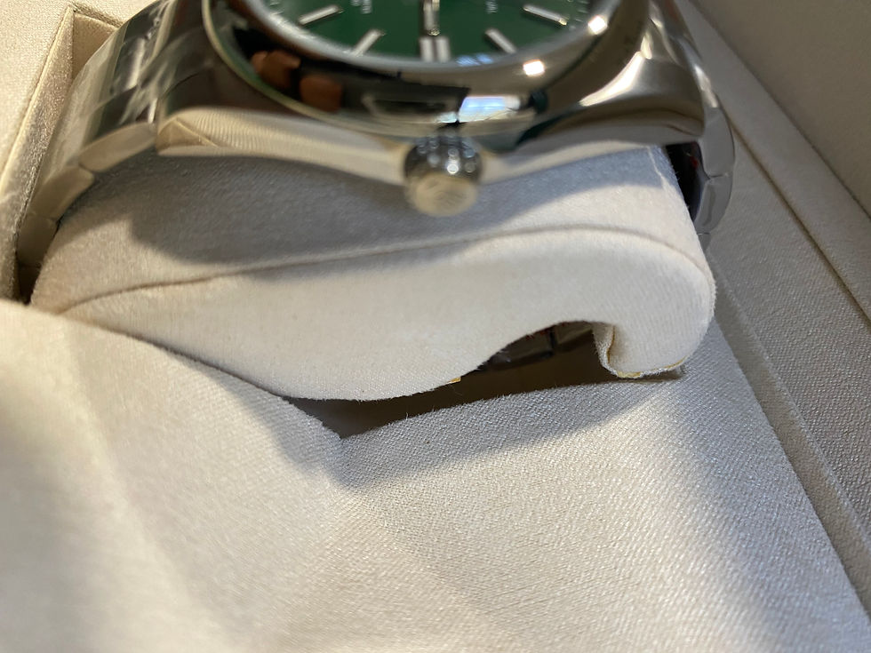 Thumbnail: Greenface platinum watch.