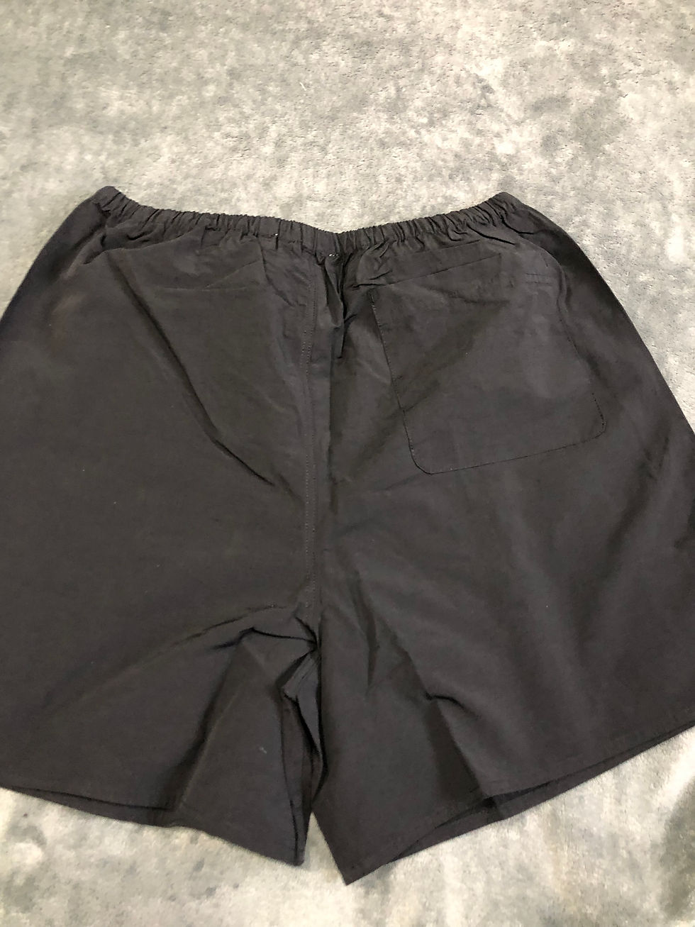 Thumbnail: Black and iridescent Essentials shorts.  s,m,l,xl,