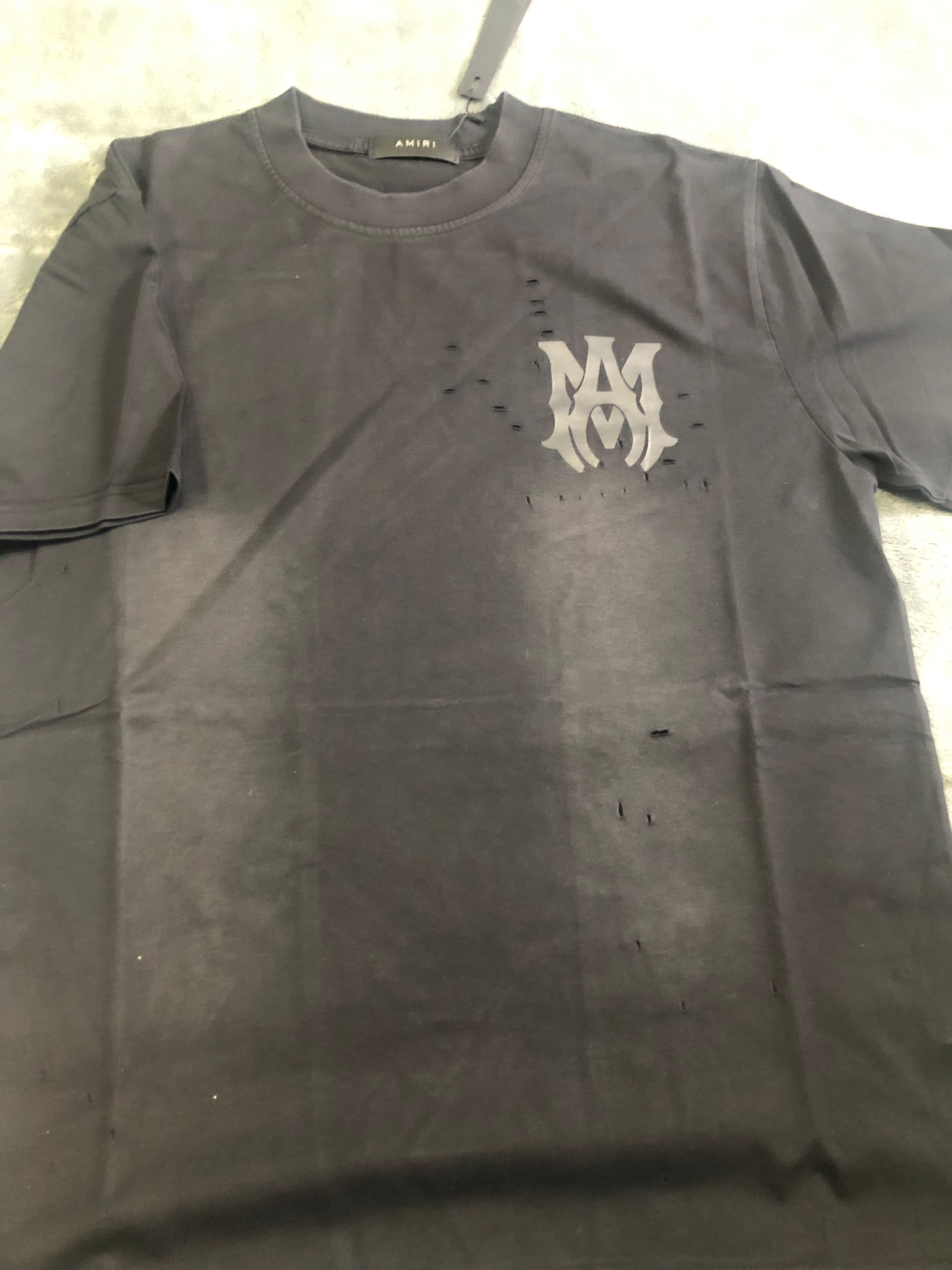 Black Faded Amiri tee.    s,m,l,xl,