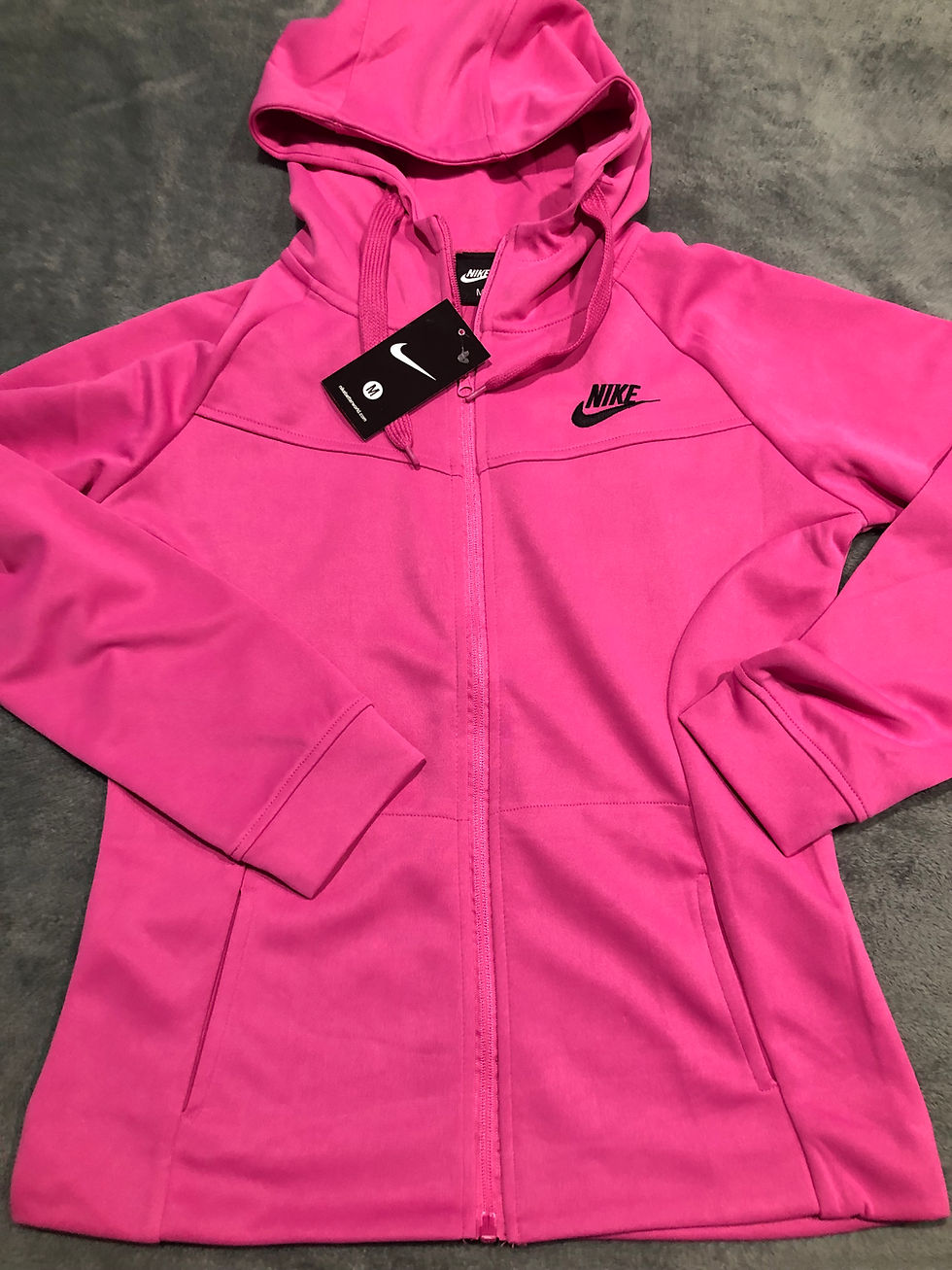 Thumbnail: Woman's Nike Tech suits