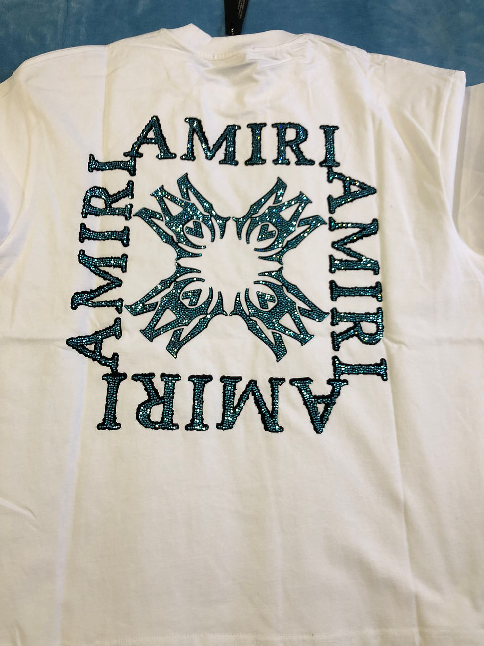 Thumbnail: Black or white Amirli Logo diamond tee.