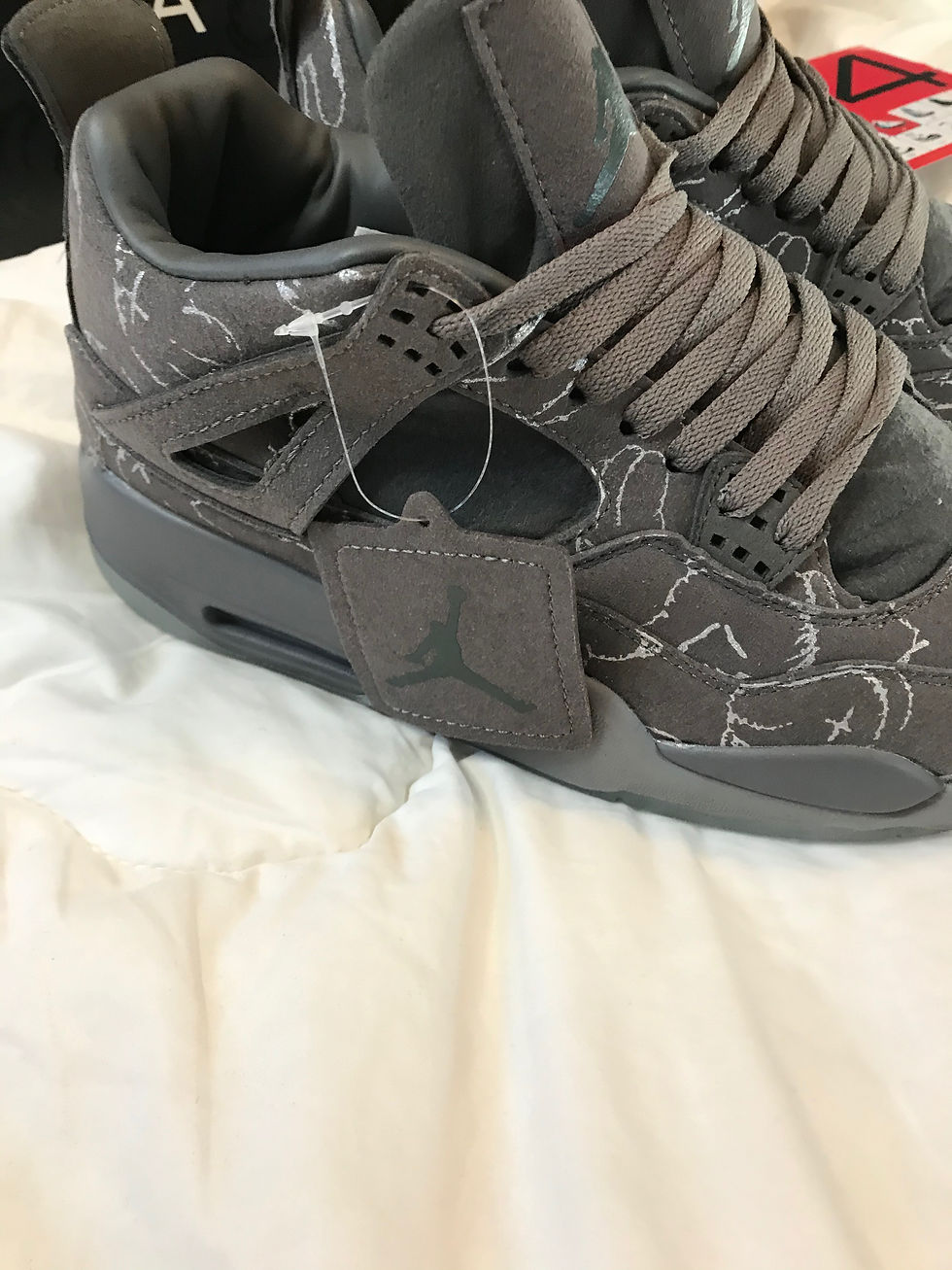 Thumbnail: Kaws/Jordan 4's