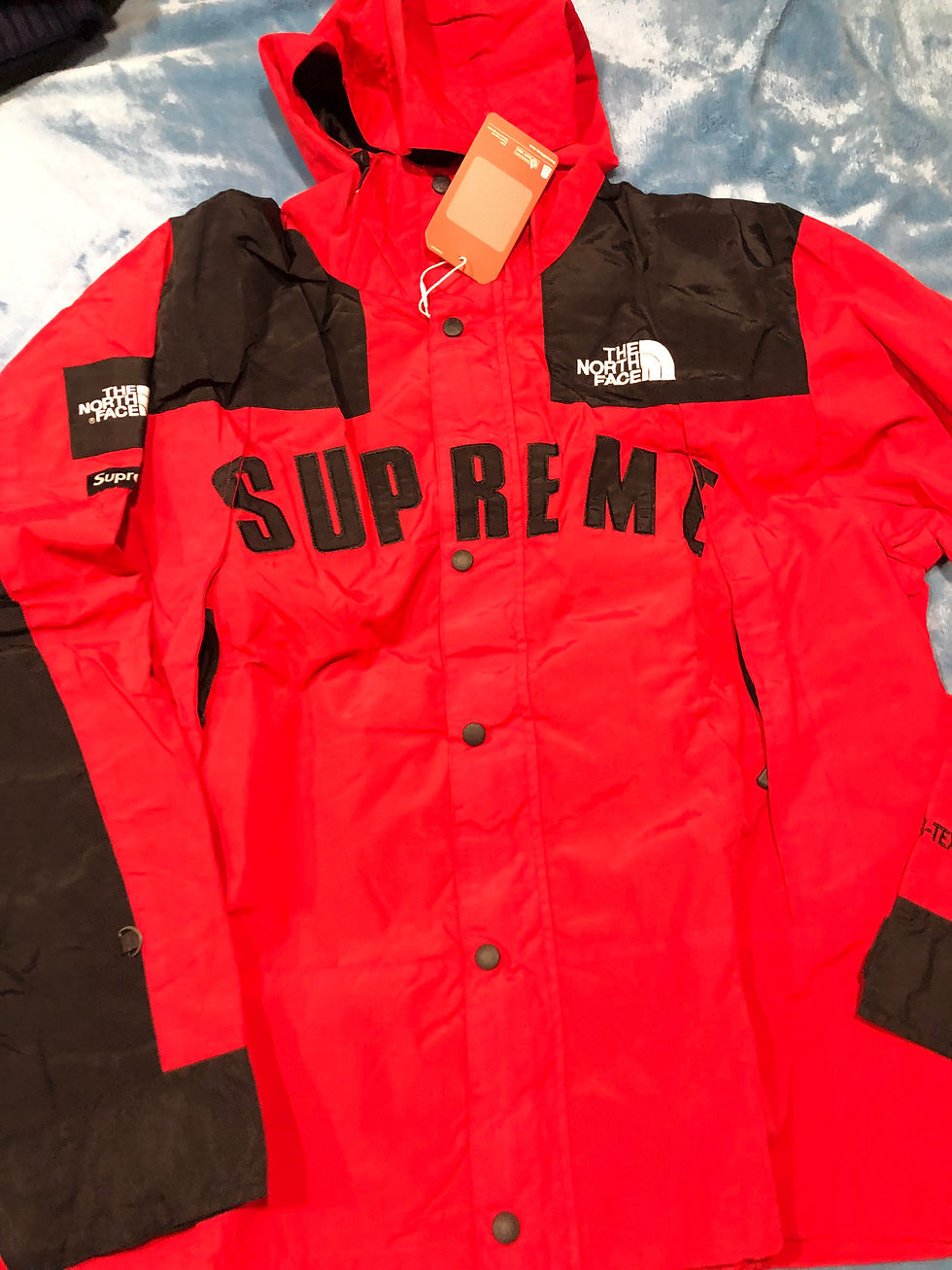 Thumbnail: Red Supreme Arc logo windbreaker