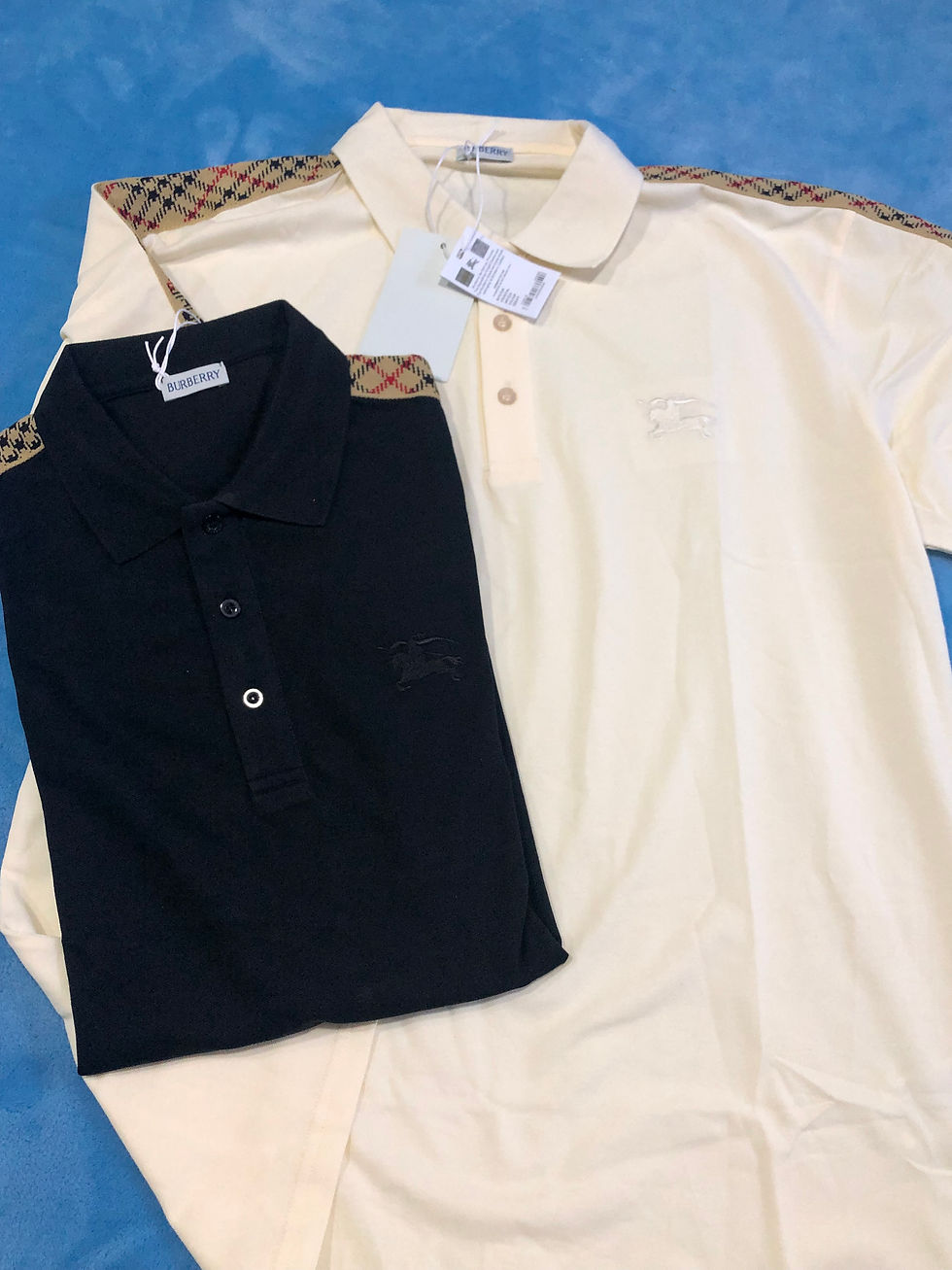 Thumbnail: Cream or black Bur Polo.  s,m,l,xl,