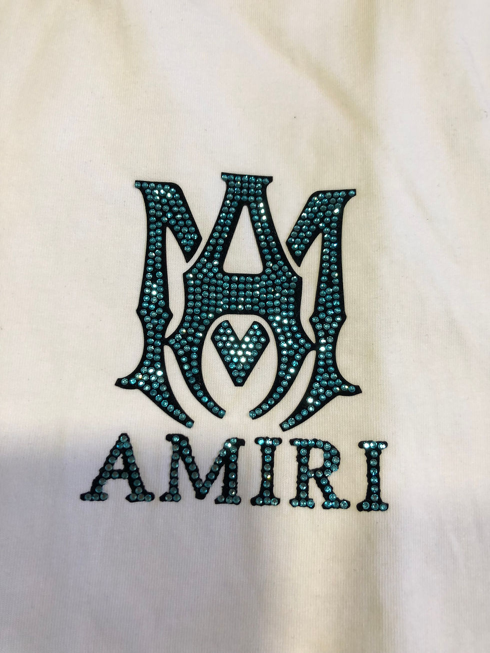 Thumbnail: Black or white Amirli Logo diamond tee.