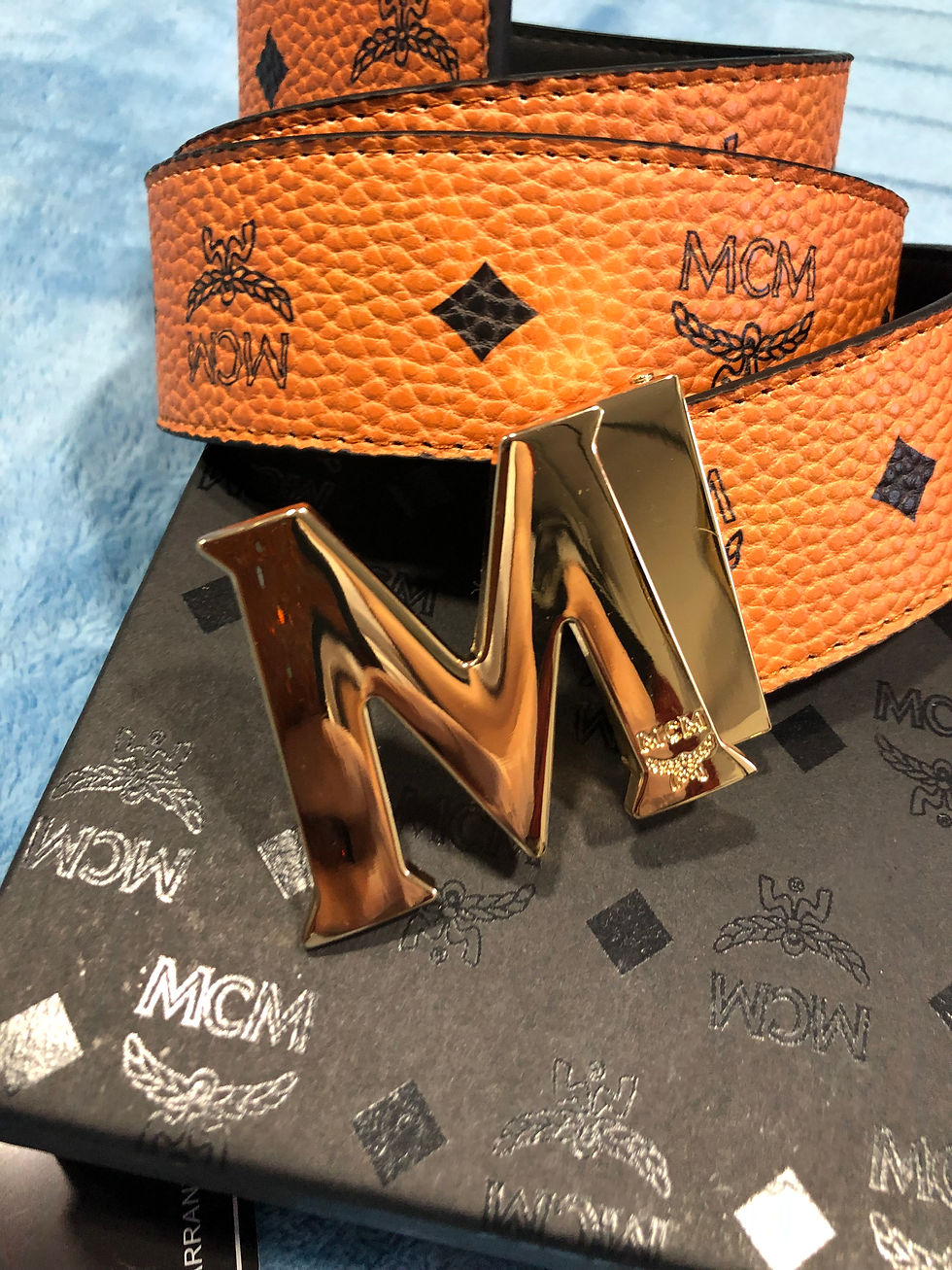 Thumbnail: red or brown MCM belts are back