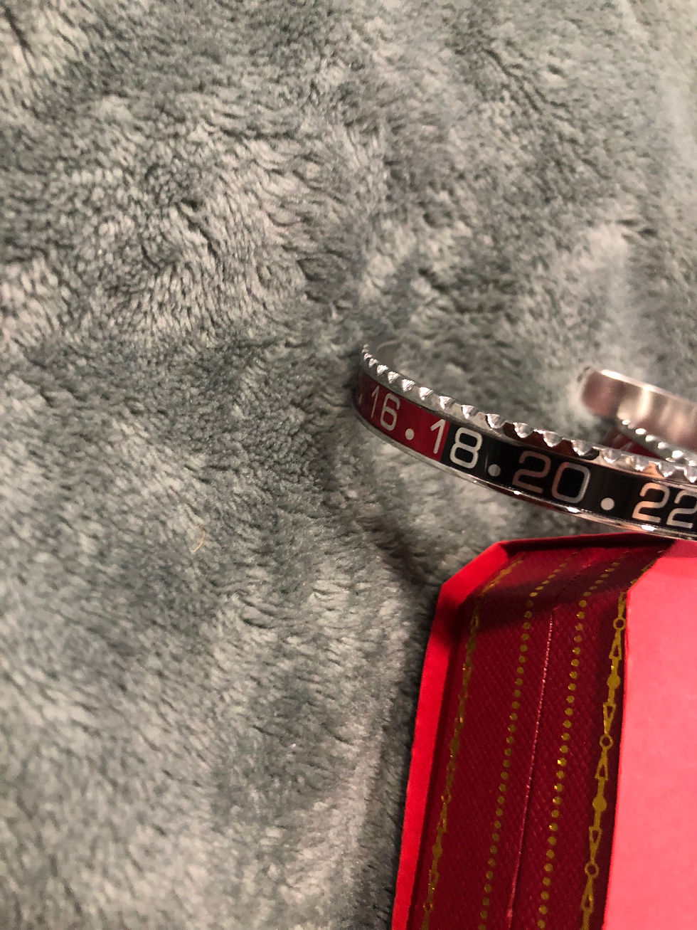 Thumbnail: Batman or Pepsi bracelets.