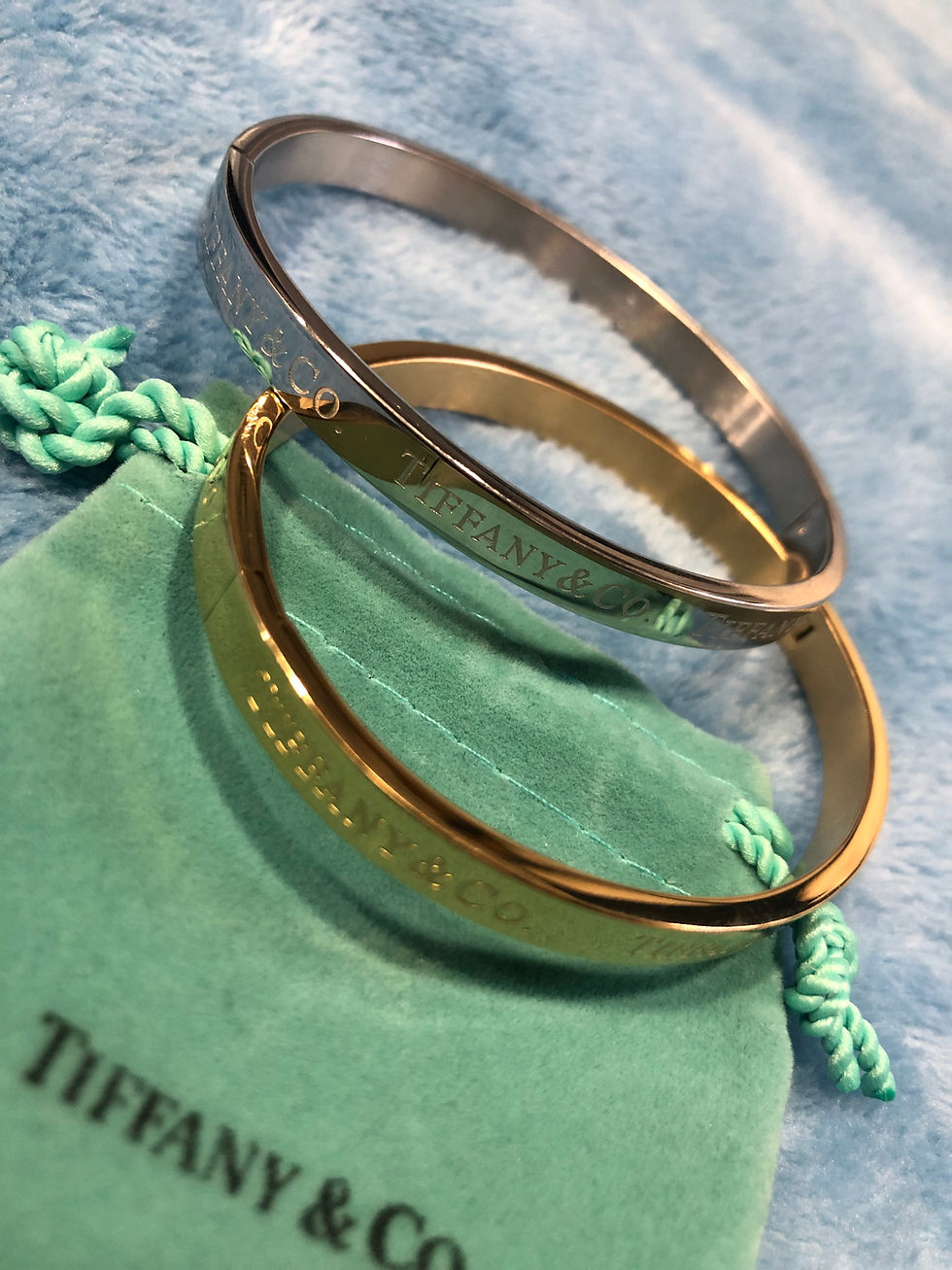 Thumbnail: Gold of silver Tiffany bracelet.