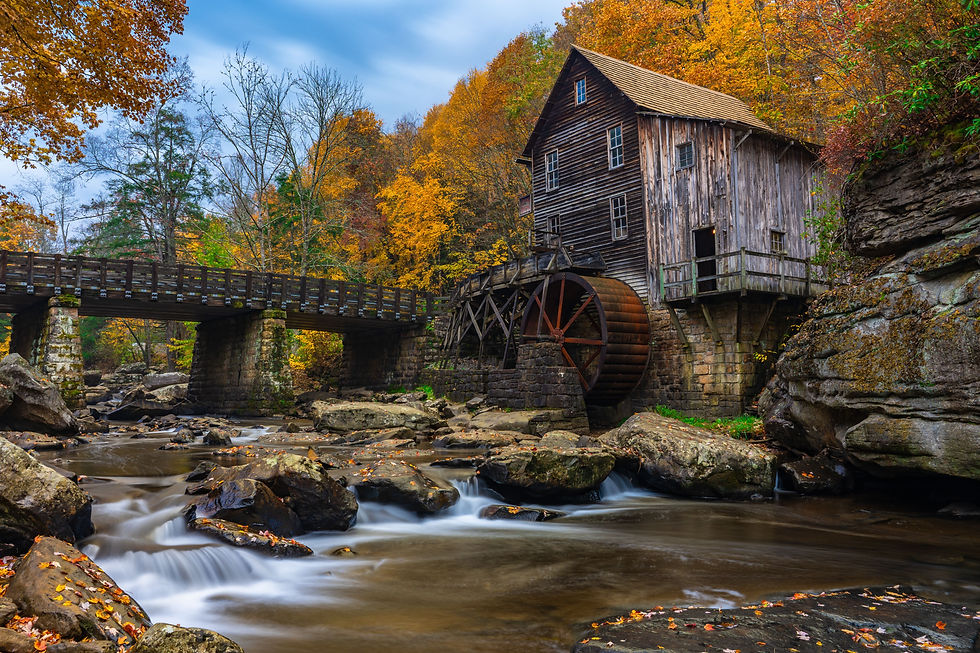 long-exposure-of-river-flowing-through-grist-mill-2023-06-05-19-28-38-utc.jpg