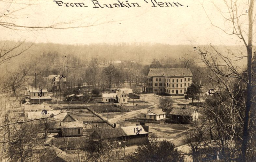 View of the Ruskin Colony on a post card. Buildings include dormitories, store, laundry.