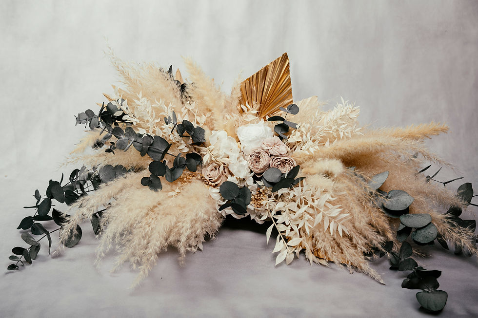 Miniaturbild: Traubogengesteck