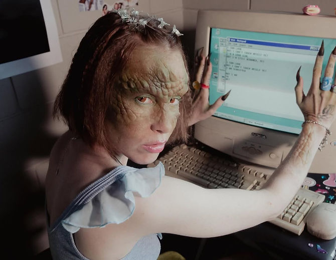 artist with millennial computer