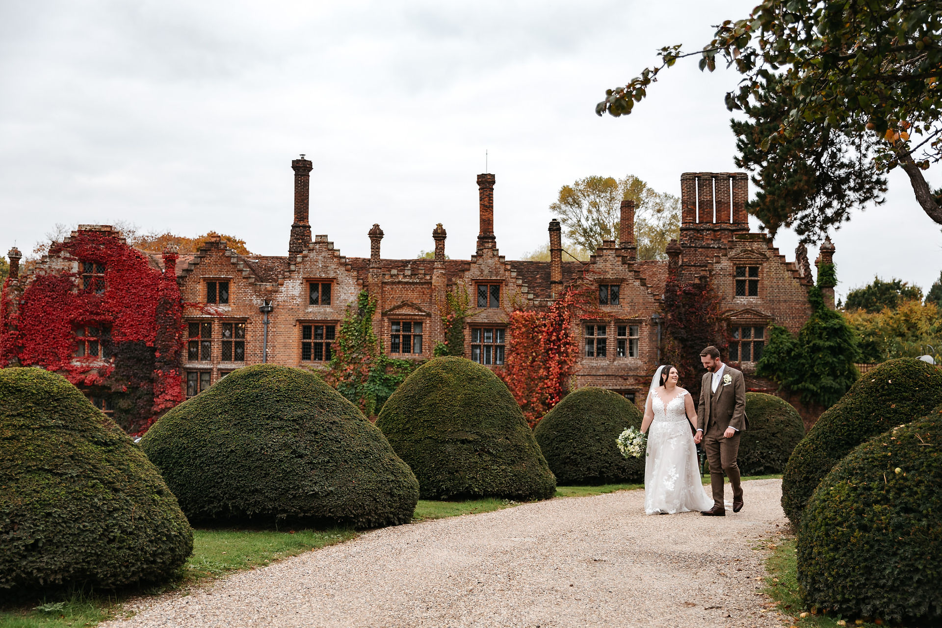 Bride and groom in front of Seckford Hall wedding 
