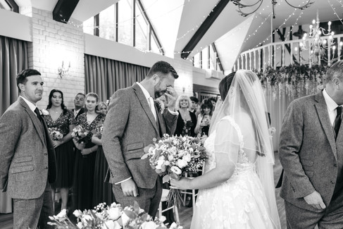 Groom crying at Seckford Hall wedding