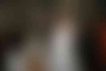 Bride eating cake at High House Wedding, Maldon