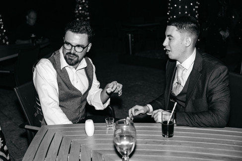 Guests doing shots at East Mersea Hall wedding