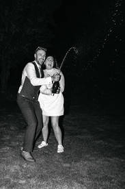 Champagne spray at High House Wedding, Maldon