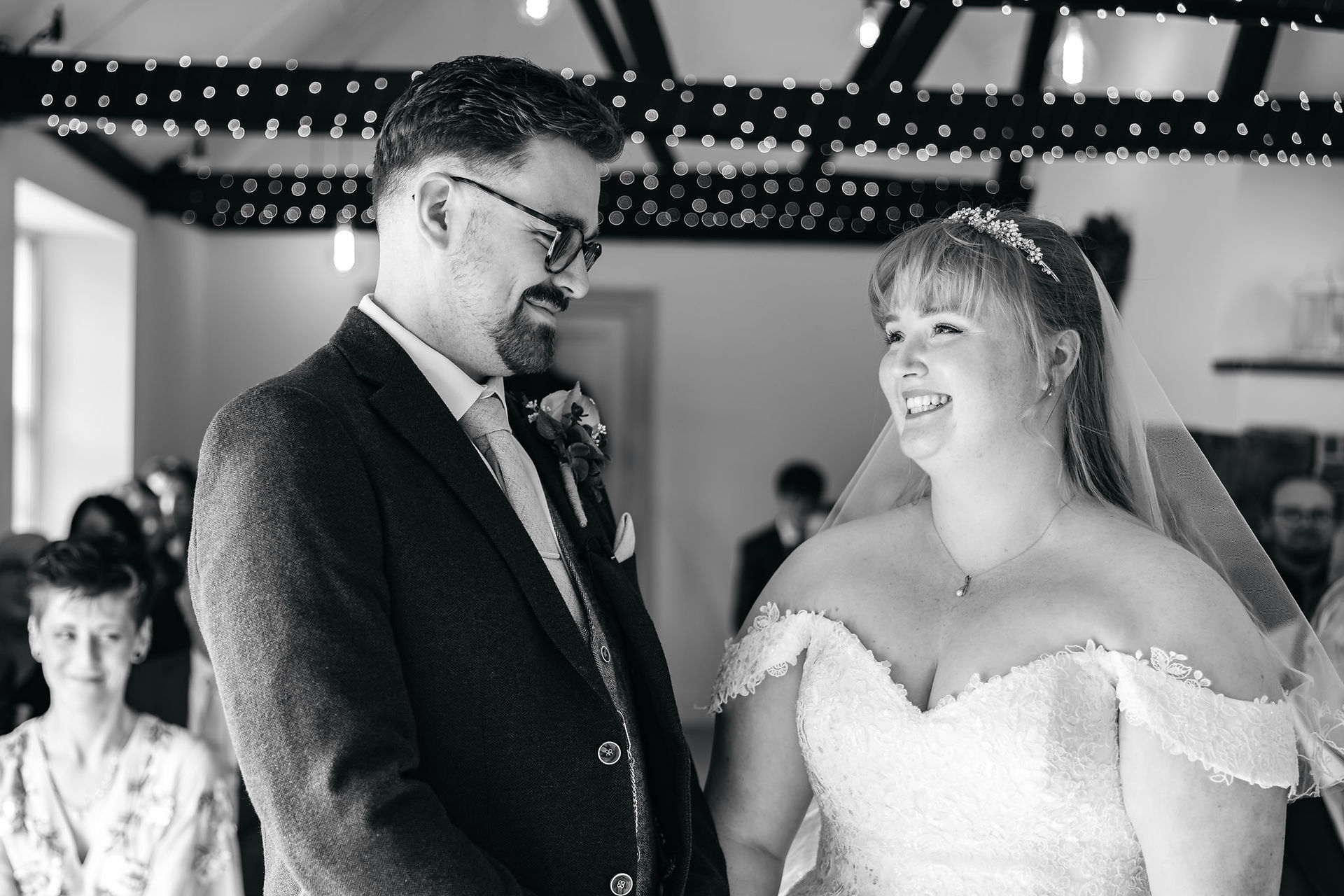 Bride and groom smiling at East Mersea Hall wedding
