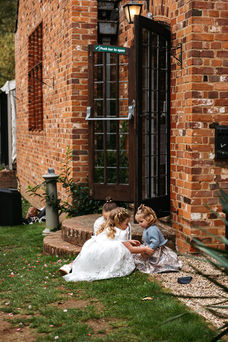 Children sitting at Seckford Hall wedding 