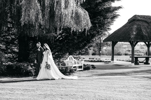 Bride and groom walking at High House Wedding, Maldon
