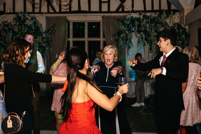 Guests dancing Seckford Hall wedding