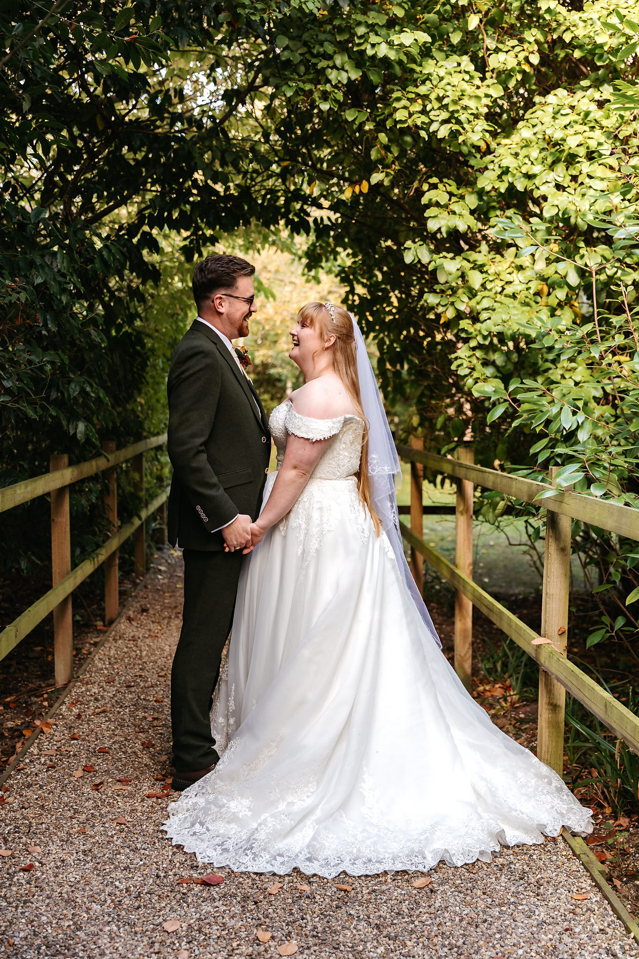 Bride and groom laughing at East Mersea Hall wedding
