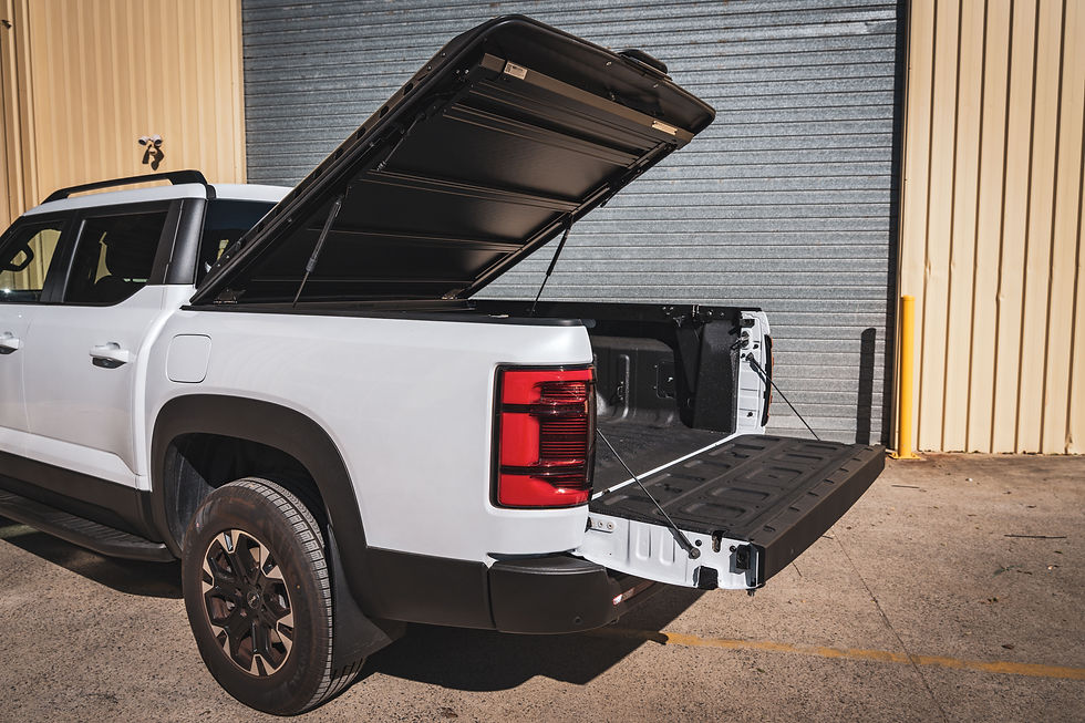 Close-up side angle of the BYD Shark’s tailgate down and the Utemaster Load-Lid open.