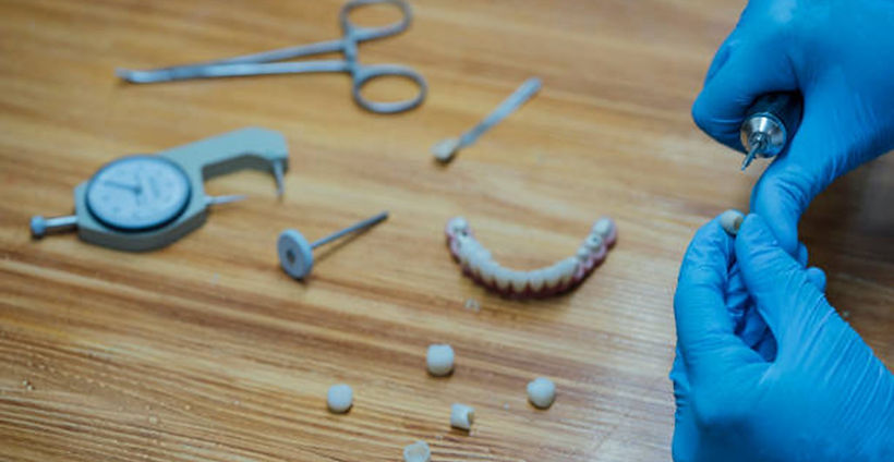 Dental Laboratory Working with Equipment