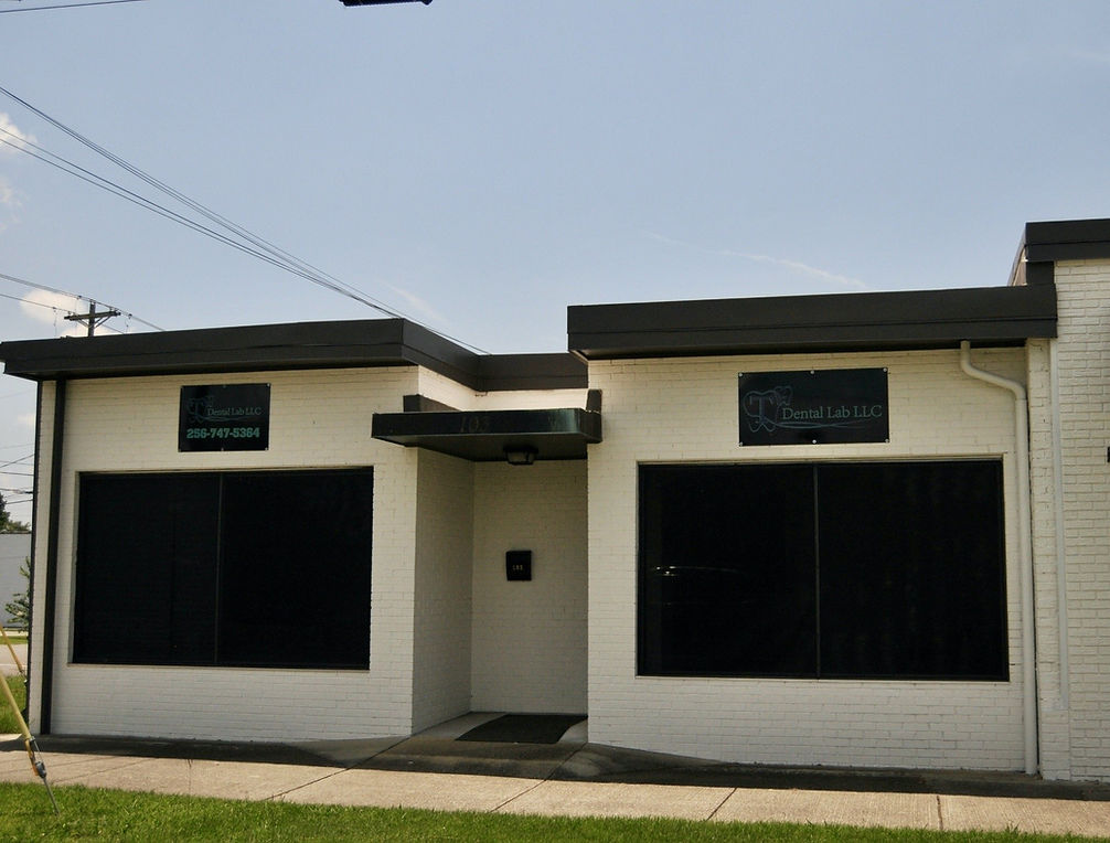 Cream-colored building, T-Squared Dental Laboratory
