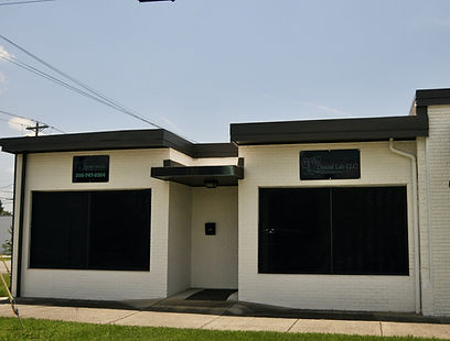 Cream-colored building, T-Squared Dental Laboratory