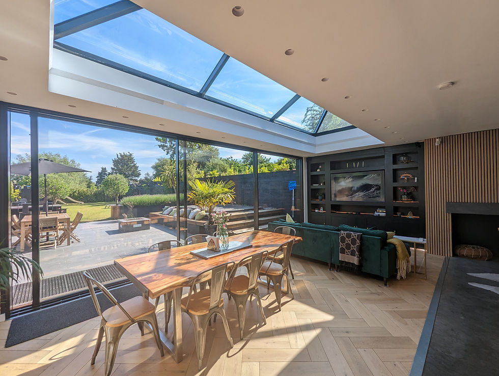 Kitchen-diner extension with a glazed roof lantern bringing natural light deep into the space.
