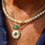 Thumbnail: Elegant 18K Gold Emerald Curb Link Chain Necklace