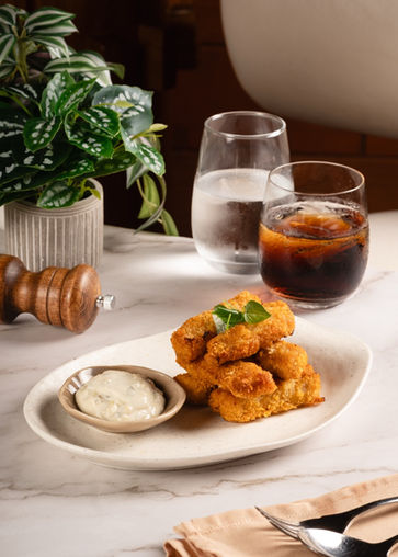 A photo of Ric's Place Whiskey & Cigar Bar's Baked Truffle Cheese Croquette at Sunlight Ecotourism Island Resort