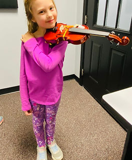 Rhea violin hold.jpeg